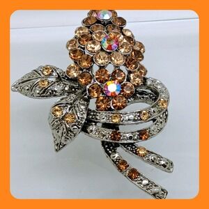 Vintage 1990s Amber Rhinestone Aurora Borealis Floral Ribbon Silver Tone Brooch